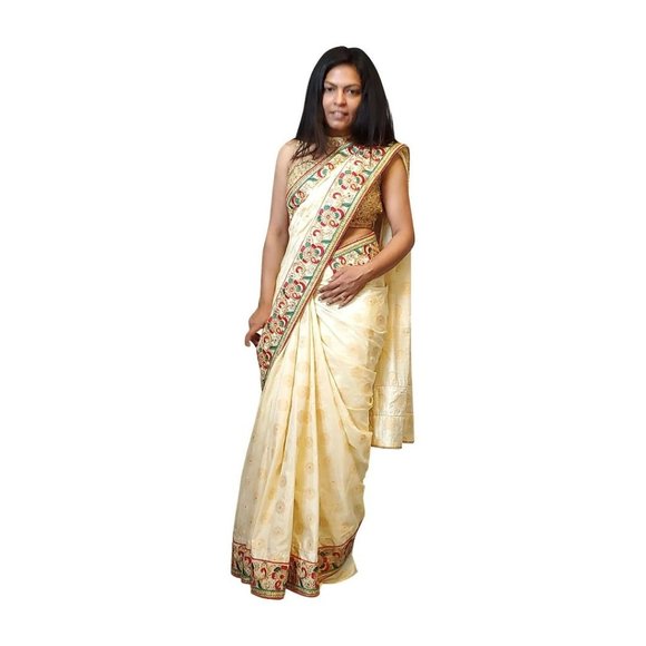 Cream colored brocade soft saree with embroidered border - Picture 2 of 3